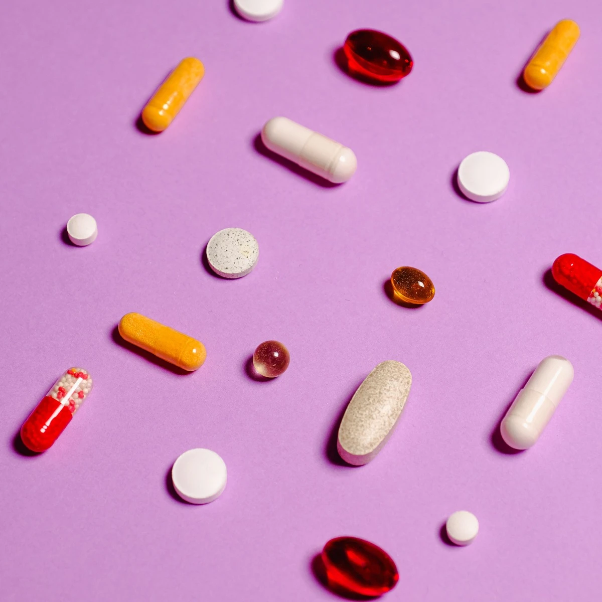Assorted capsules and tablets representing a range of hormone therapy options