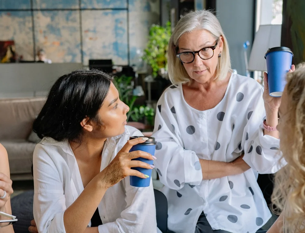 Women discussing menopause care together