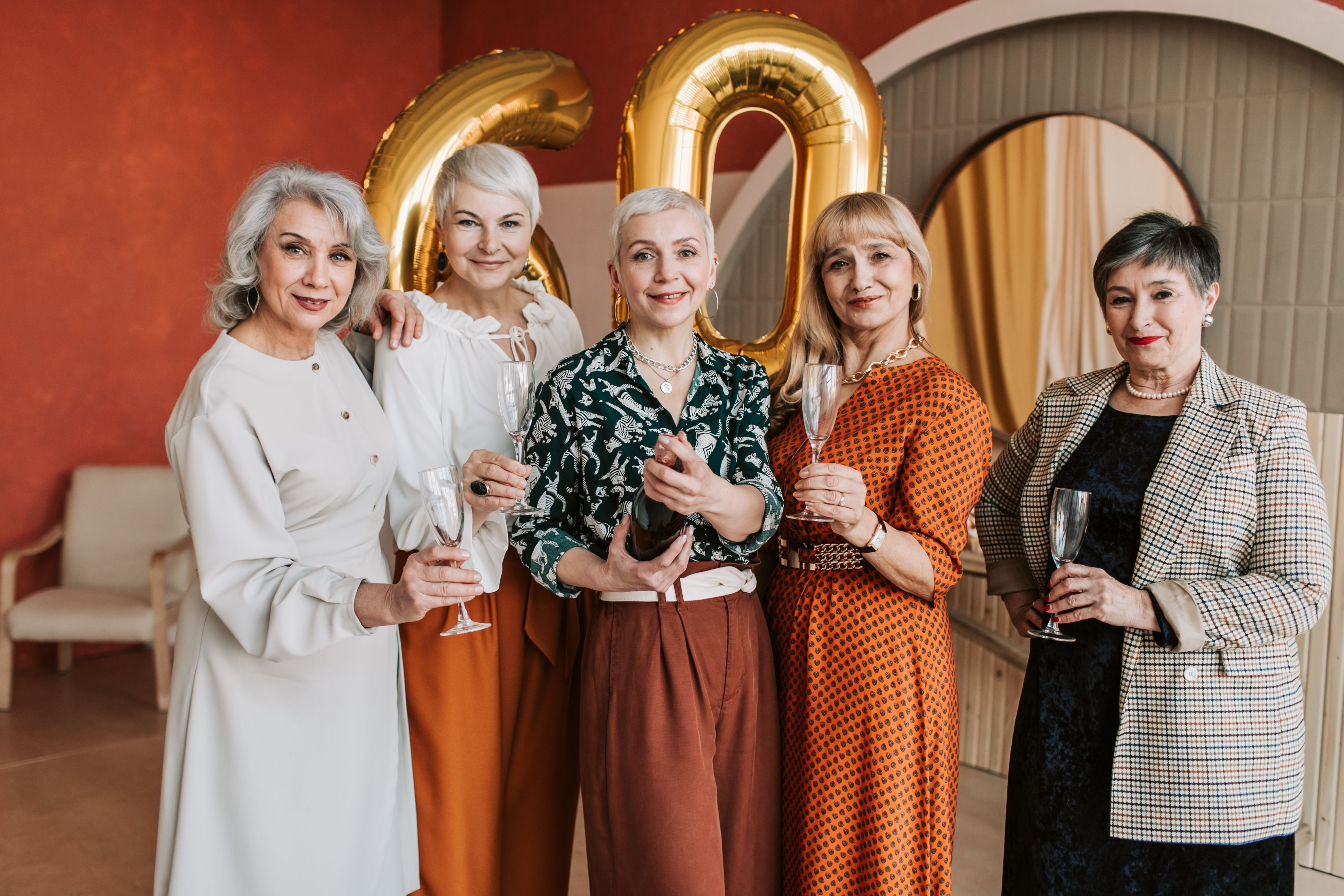 Five women celebrating together